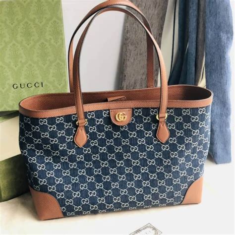 gucci medium tote black denim.